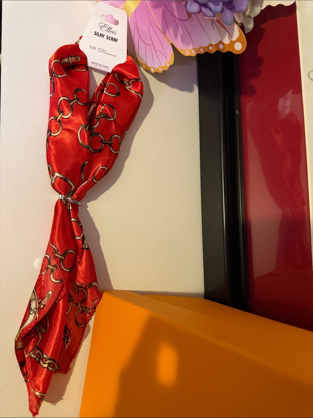 Red Silky Scarf with Gold Chain Motif